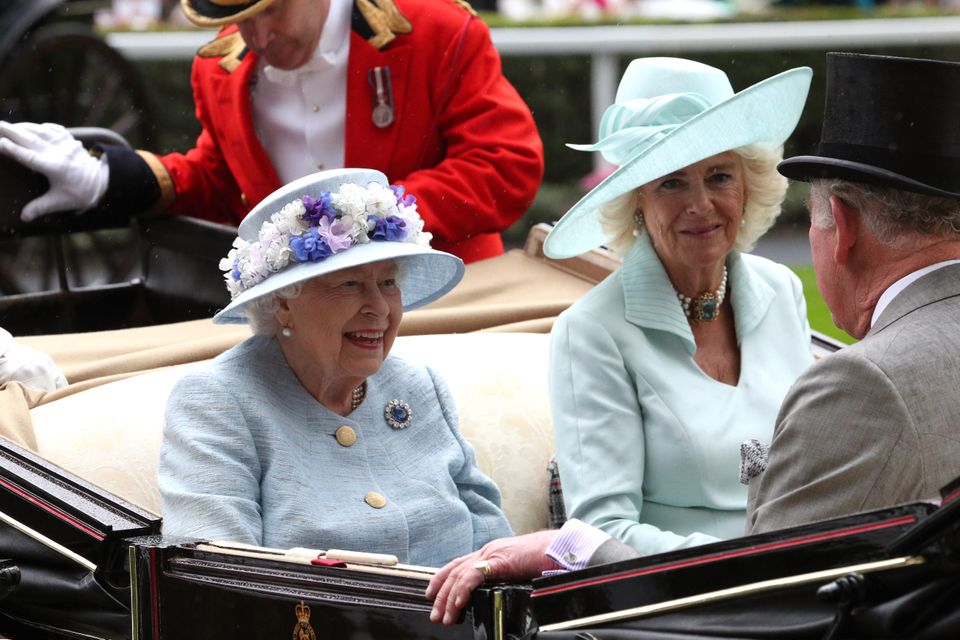 The Queen and Duchess of Cornwall during the royal procession at Ascot in 2019 (Jonathan Brady/PA)