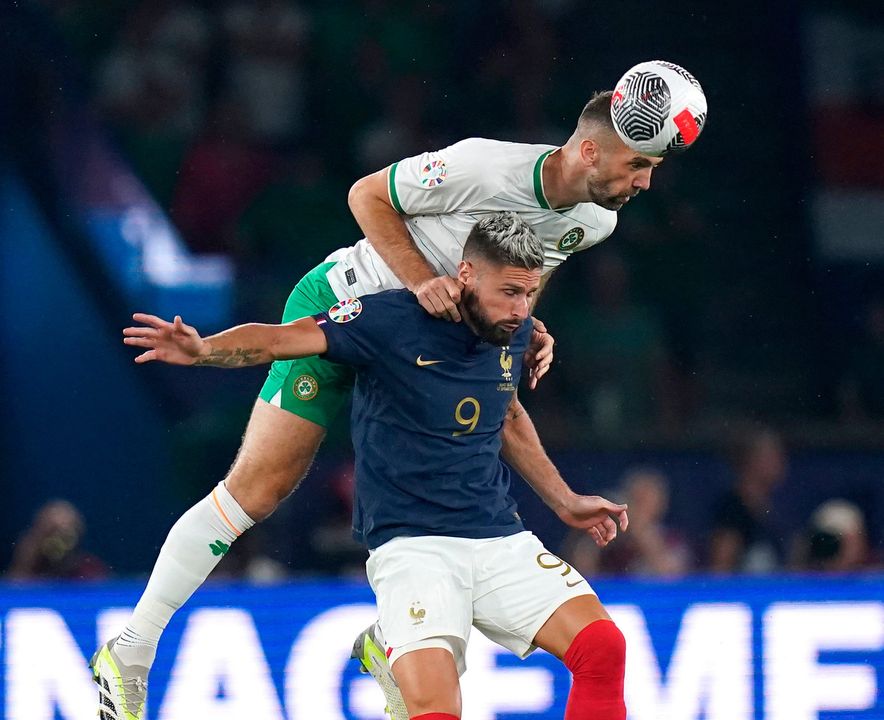 France's Olivier Giroud and Ireland's Shane Duffy battle for the ball during the UEFA Euro 2024 Qualifying Group B match at the Parc des Princes, Paris