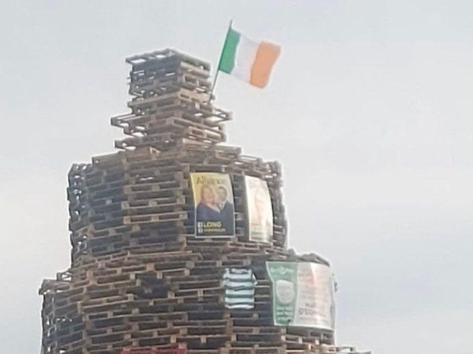 A bonfire in the Cregagh area of east Belfast that reads "All Taigs are targets"
