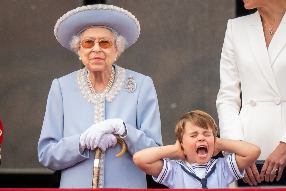The noise of the planes flying in formation over Buckingham Palace after Trooping the Colour on Thursday seemed too much for young Prince Louis. While his great-grandmother watched serenely beside him from the balcony, the four-year-old clamped his hands firmly over his ears (Aaron Chown/PA)