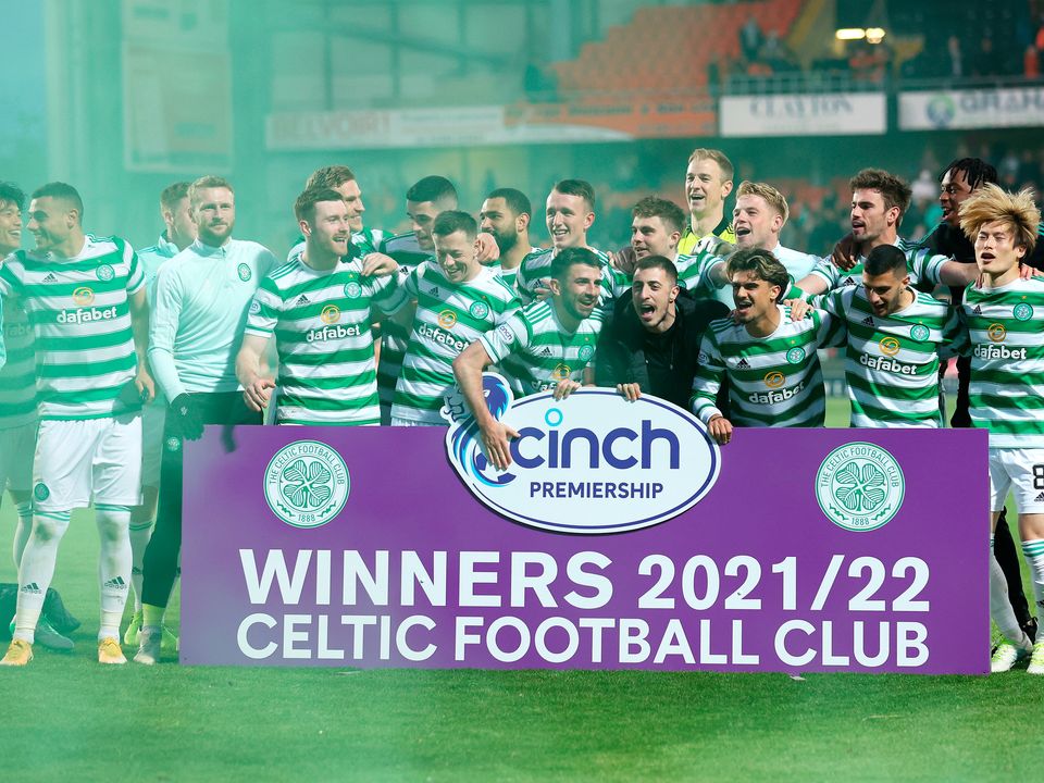 Celtic players celebrate winning the Cinch Scottish Premiership title following match against Dundee United Tannadice. (Photo by Ian MacNicol/Getty Images)