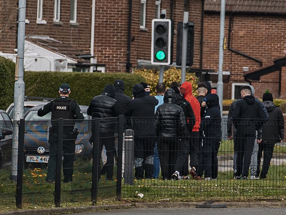 Police deal with a number of masked men approaching Weavers Grange in Newtownards on March 30th, 2023 (Photo by Kevin Scott for Belfast Telegraph)