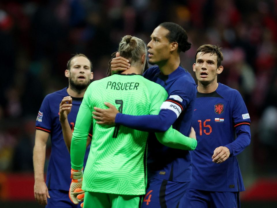 Holland's Remko Pasveer and Virgil van Dijk celebrate Nations League victory over Poland. Photo: Reuters
