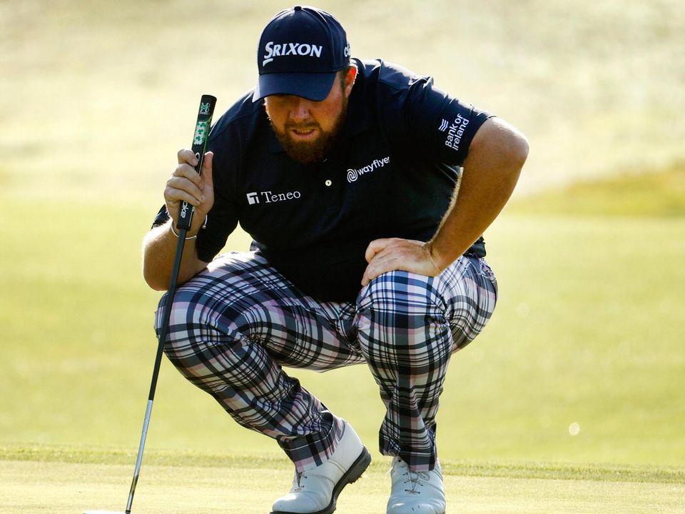 Shane Lowry wearing checked slacks chosen by playing partner Ian Poulter. Photo: Chris Graythen/Getty Images