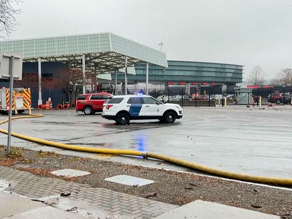 In this photo taken from video provided by WKBW-TV, emergency response vehicles block off a checkpoint at the Rainbow Bridge, Wednesday, Nov. 22, 2023, in Niagara Falls, N.Y. A vehicle exploded at a checkpoint on the American side of a U.S.-Canada bridge in Niagara Falls Wednesday, leaving two people dead and prompting the closing of four border crossings in the area, authorities said. (WKBW-TV via AP)