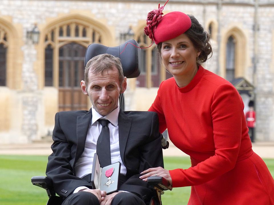 Robert Burrow with his wife Lindsey after he was made an MBE by the Princess Royal (Steve Parsons/PA)