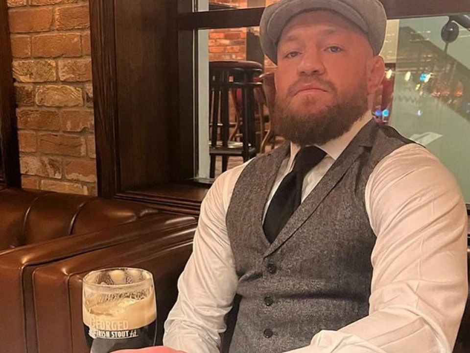 Conor McGregor enjoys a pint in the Black Forge