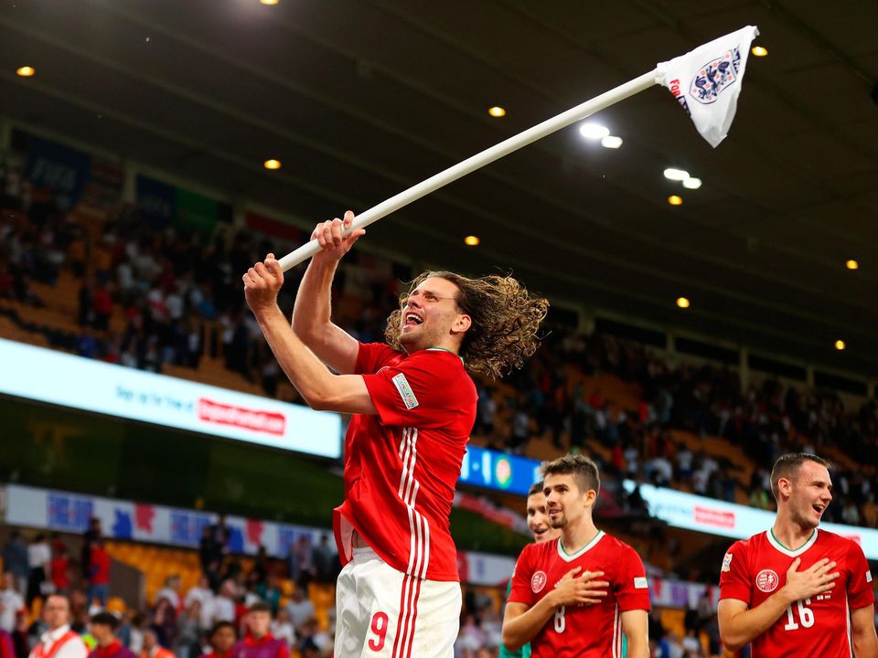 Hungary's Adam Szalai celebrates with the corner flag after their side's 4-0 victory over England in the Nations League, League A Group 3 match at Molineux, Wolverhampton last night. Photo: Catherine Ivill/Getty Images