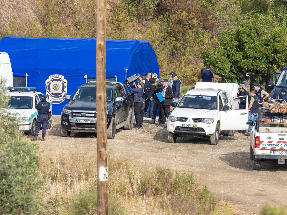 Portuguese search teams and German police at Barragem reservoir in Portugal yesterday, around 30 miles from where Madeleine McCann went missing in 2007. Photo: Solarpix