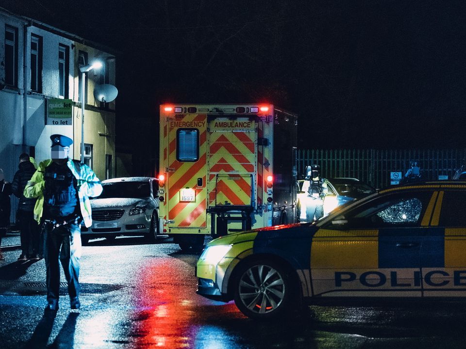 Police at the scene of the murder of Shane Whitla in Lurgan last month: Picture by Kevin Scott