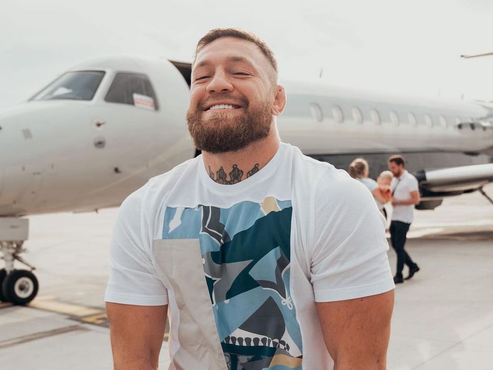McGregor pictured with the Legacy-600 jet in the background