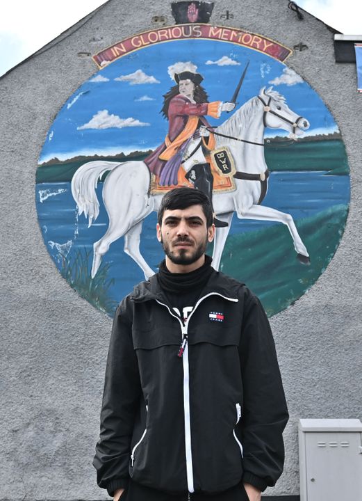 Mizu at a loyalist mural in Belfast this week – he says he doesn’t understand the sectarian divide in Northern Ireland