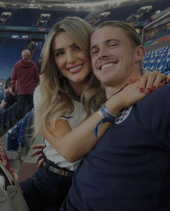 WAG Aine May is snapped with England's Conor Gallagher after their 1-0 win over Serbia last week in Gelsenkirchen.