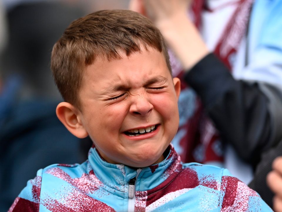 A Burnley fan reacts following defeat and relegation to the Championship. (Photo by Gareth Copley/Getty Images)