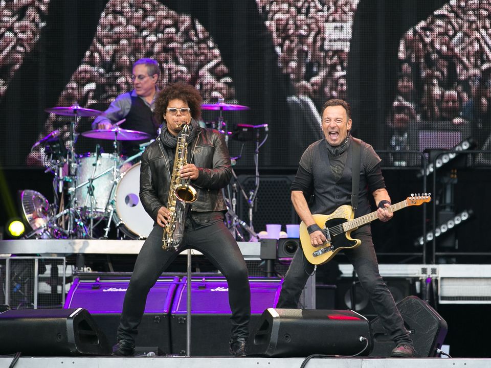 Jake Clemons and Bruce Springsteen performs with the E Street Band at Croke Park Stadium on May 27, 2016 in Dublin, Ireland.