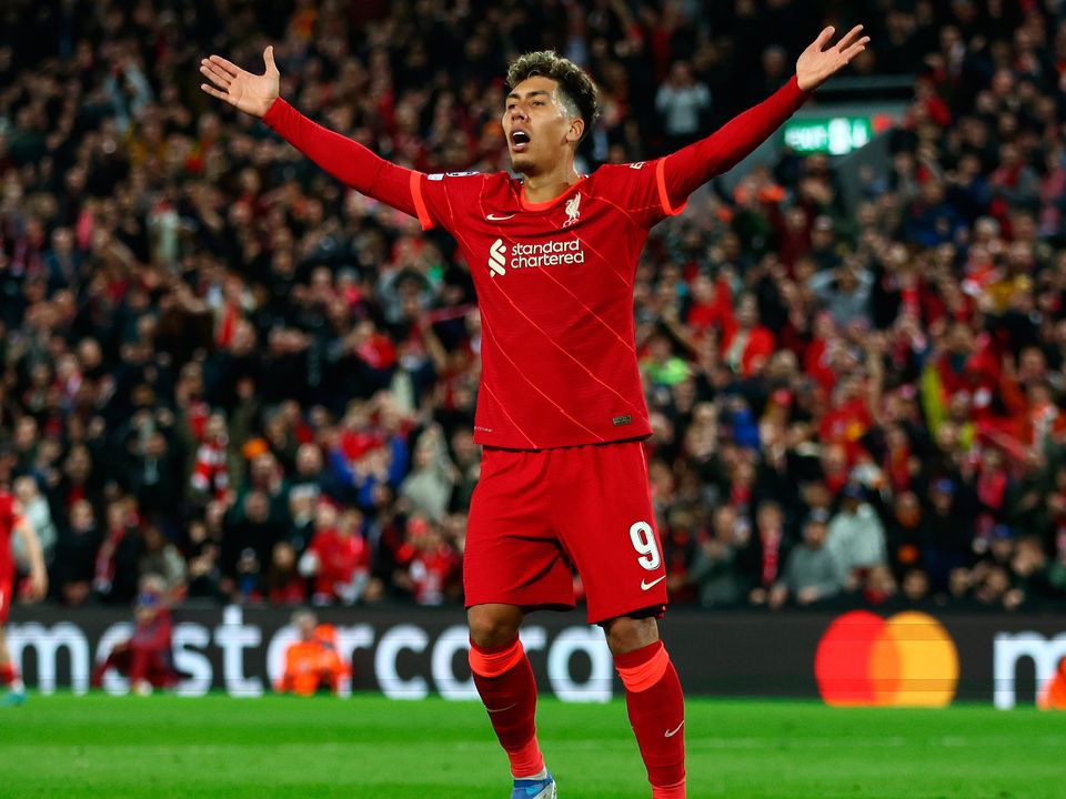 Roberto Firmino of Liverpool reacts during the UEFA Champions League quarter-final at Anfield. (Photo by Clive Brunskill/Getty Images)