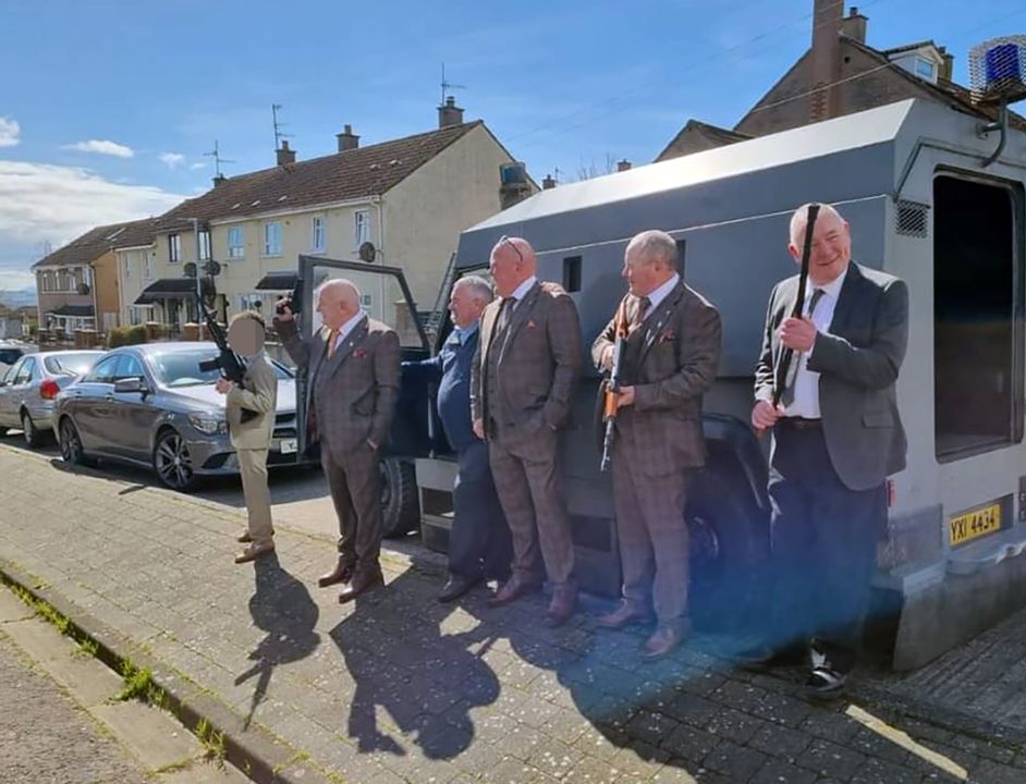Fryers, along with wedding guests pose for photos beside the former RUC Land Rover