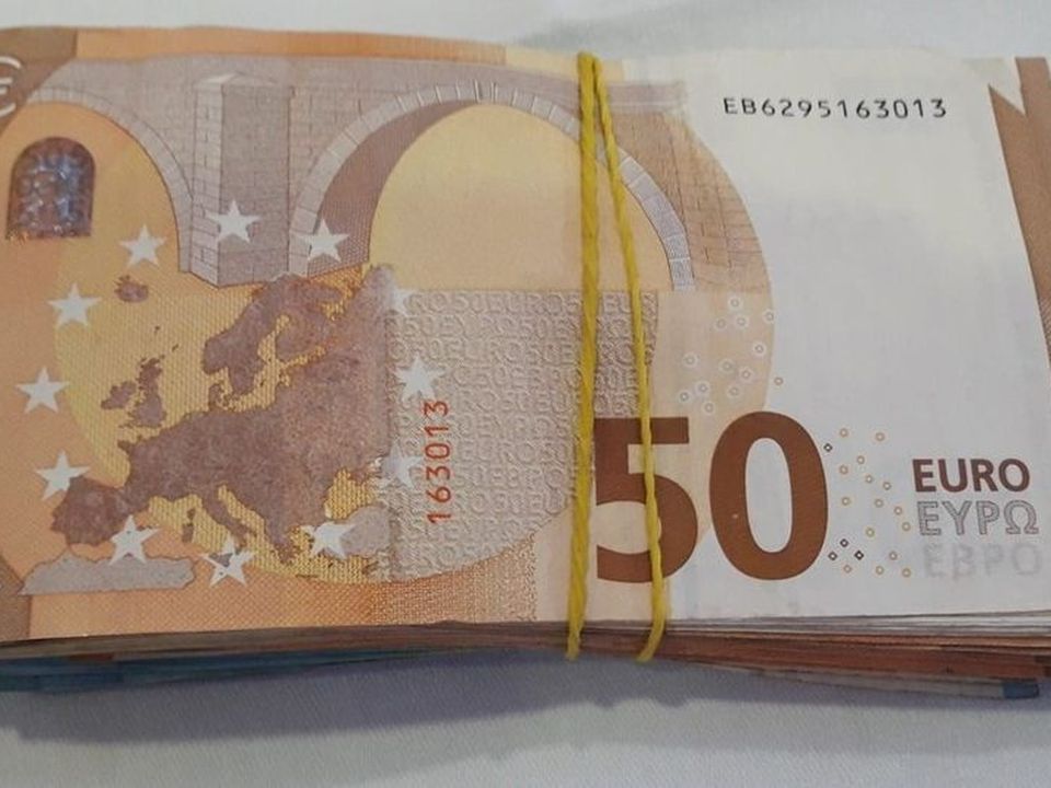 Bundle of €50 notes hidden by girlfriend