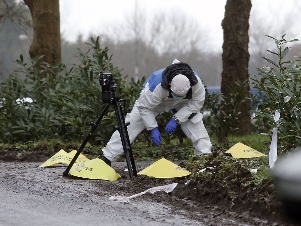 Forensics at the scene after the attempted murder of Detective Chief Inspector John Caldwell