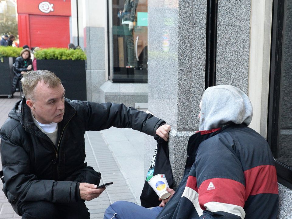 Eugene Masterson pictured talking to Dublin's homeless