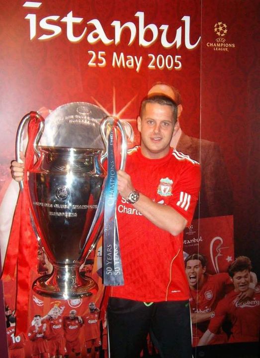 Liverpool fan William Gracey poses with the European Cup