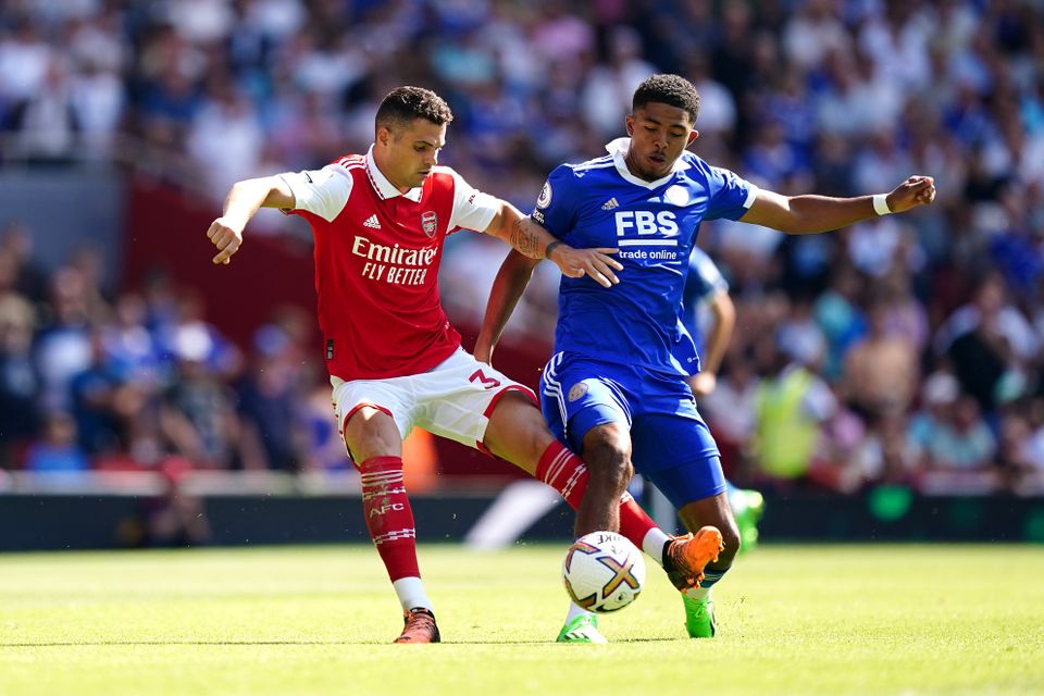 Arsenal's Granit Xhaka (left) and Leicester City's Wesley Fofana battle for the ball during the Premier League match at the Emirates Stadium, London. Picture date: Saturday August 13, 2022.