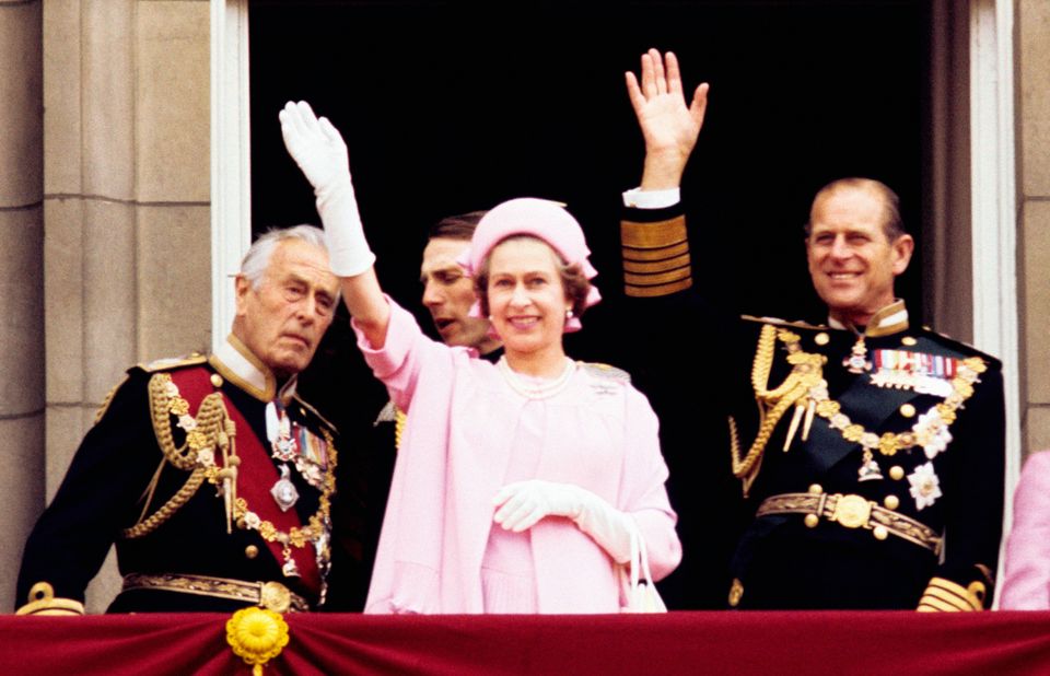 07/07/1977 of (left to right) Earl Mountbatten of Burma, Queen Elizabeth II and the Duke of Edinburgh waving from the balcony of Buckingham Palace after the Silver Jubilee procession