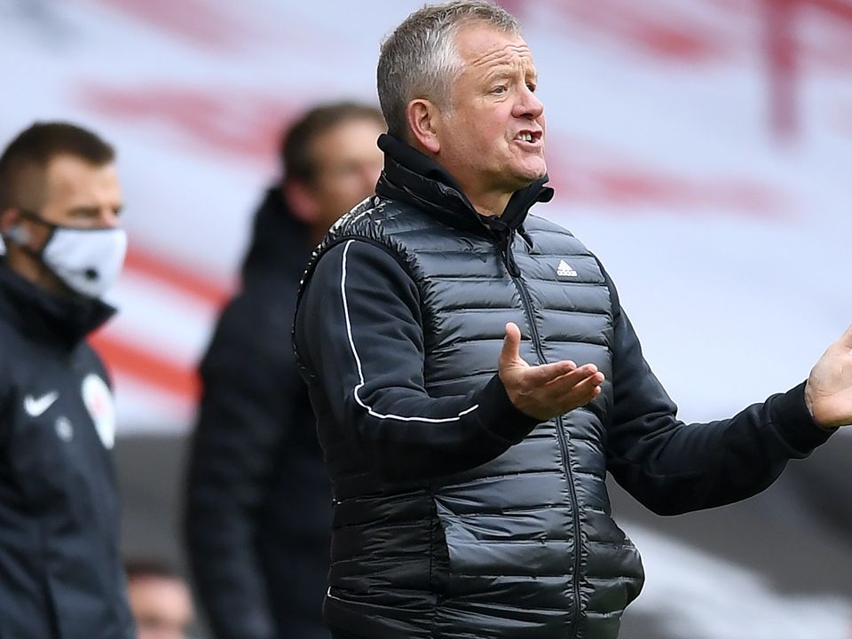 Sheffield United manager Chris Wilder insists his players will stick together after a first point of the season from a 1-1 draw with Fulham.