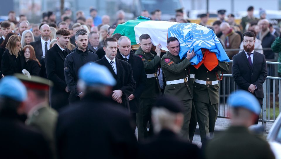 The remains of Private Sean Rooney arrive for his funeral mass in Dundalk.  Picture; Gerry Mooney