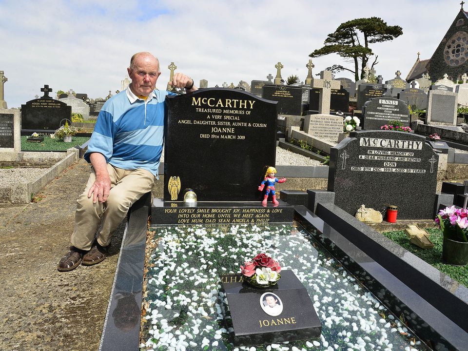 Former Alliance MLA Kieran McCarthy at his daughter’s grave