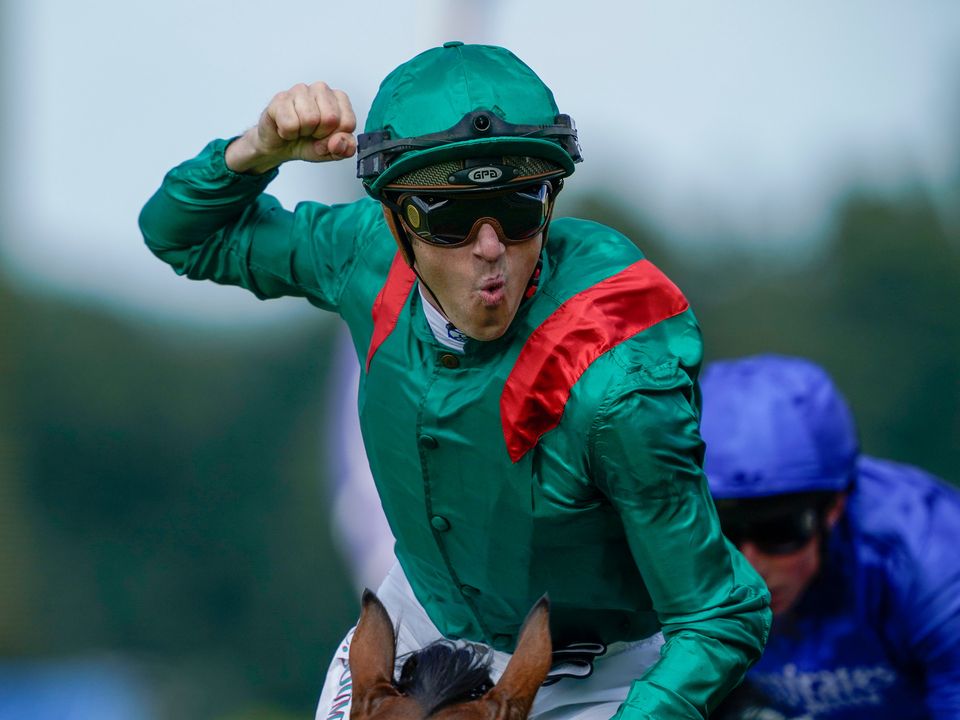 Christophe Soumillon celebrates after riding Vadeni to win The Coral-Eclipse at Sandown Park on July 02, 2022 in Esher, England. (Photo by Alan Crowhurst/Getty Images)
