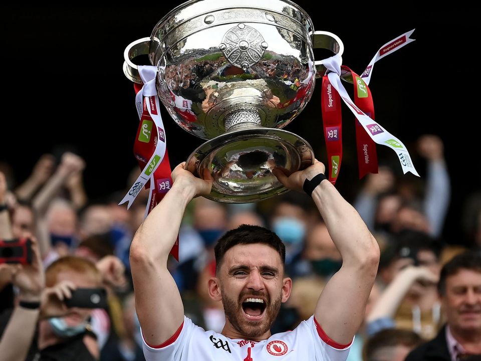 Tyrone captain Pádraig Hampsey lifts the Sam Maguire following his team's win over Mayo last September. Photo: Stephen McCarthy/Sportsfile