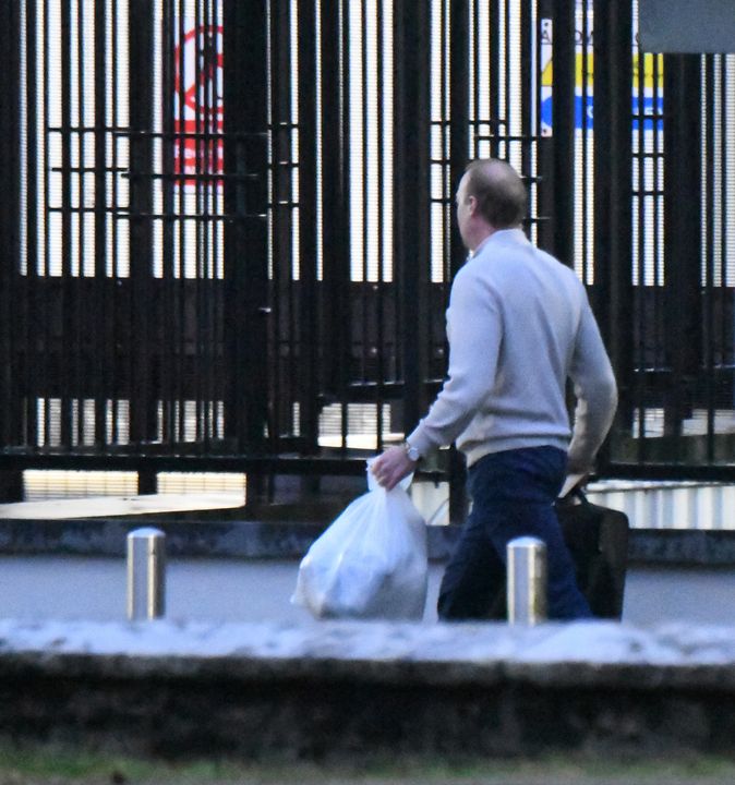 Mansfield was seen carrying two plastic bags as he walked from the prison
