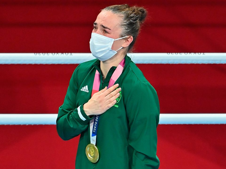 An emotional Kellie getting her gold medal