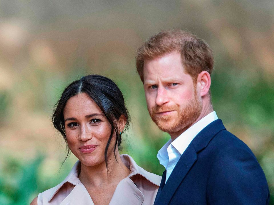 Prince Harry and wife Meghan Markle (Photo by MICHELE SPATARI/AFP via Getty Images)