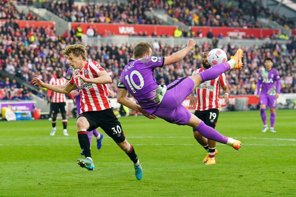 Harry Kane, centre, sends an acrobatic late effort wide (Adam Davy/PA)