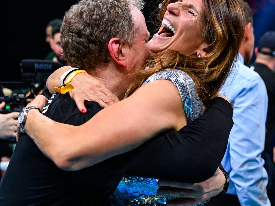 25 November 2023; Bridget Taylor, mother of Katie Taylor, and manager Brian Peters celebrate Katie Taylor's victory in the undisputed super lightweight championship fight against Chantelle Cameron at the 3Arena in Dublin. Photo by Stephen McCarthy/Sportsfile