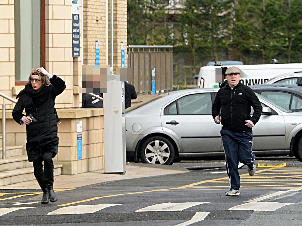 Gunmen, including Kevin Murray (right) flee the scene of the attack