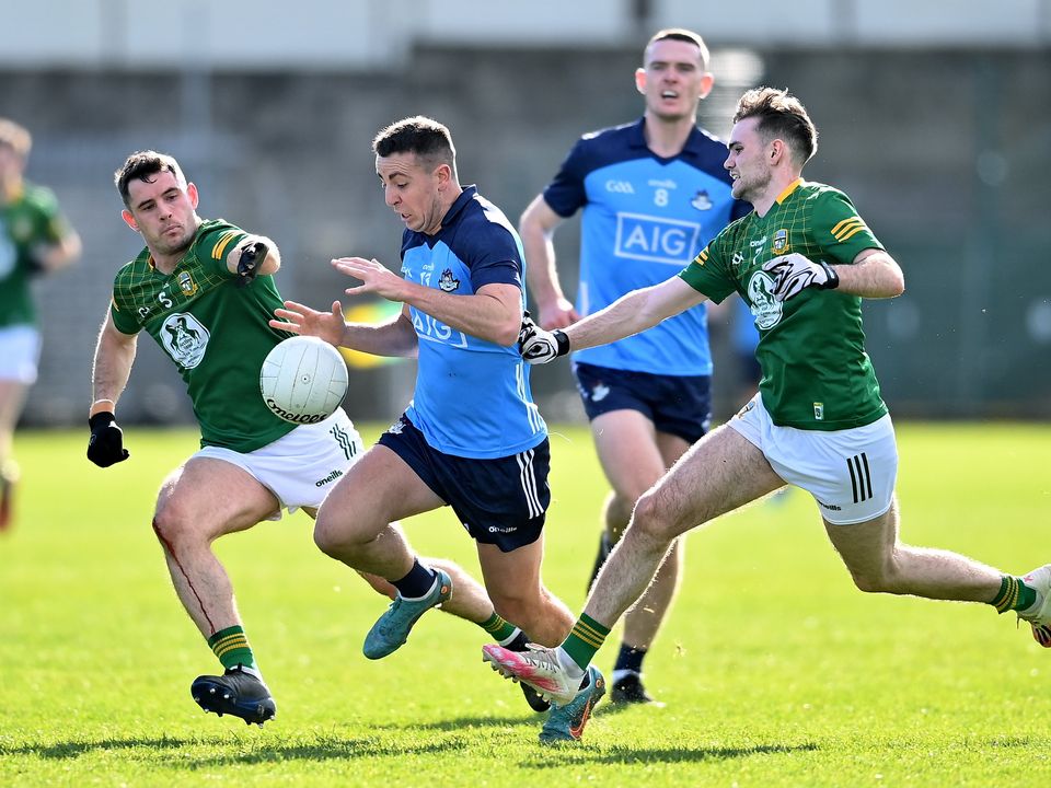 Dublin’s Cormac Costello beats Cathal Hickey, right, and Donal Keogan of Meath