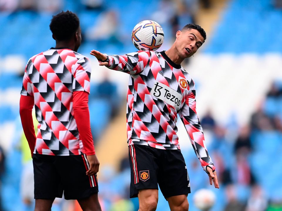 Cristiano Ronaldo of Manchester United warms up ahead of the Premier League match against Manchester City. Photo by Laurence Griffiths/Getty Images