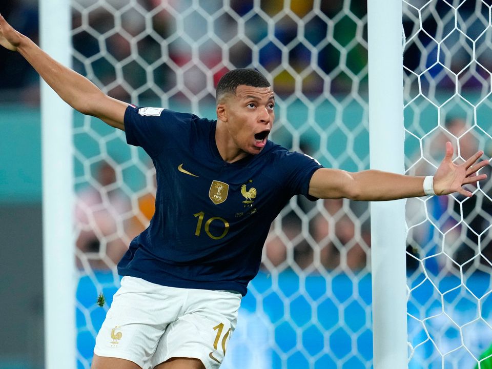 France's Kylian Mbappe celebrates scoring their side's second goal of the game during the FIFA World Cup Group D match at Stadium 974 in Doha, Qatar. Picture date: Saturday November 26, 2022. PA Photo. See PA story WORLDCUP France. Photo credit should read: Nick Potts/PA Wire.

RESTRICTIONS: Use subject to restrictions. Editorial use only, no commercial use without prior consent from rights holder.