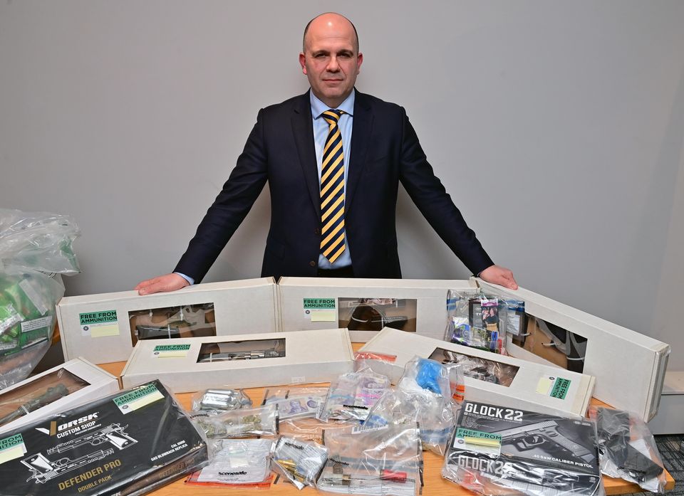 Det Chief Insp Richard Thornton with some of the drugs and weapons seized this week