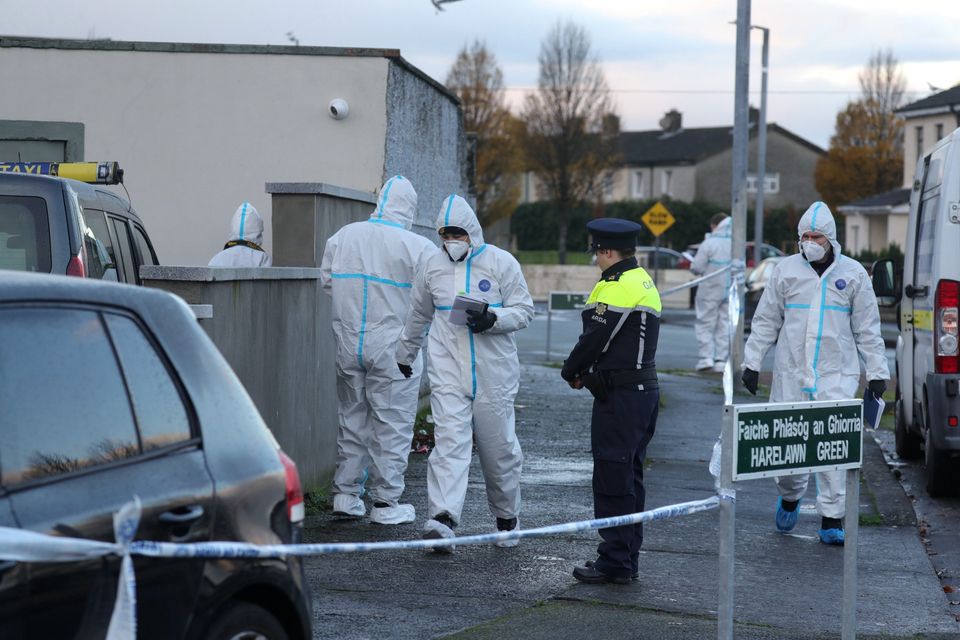 06/12/2022 Gardaí and forensics personnel at the scene of the fatal shooting in Harelawn Park Ronanstown Dublin.Picture Colin Keegan, Collins Dublin