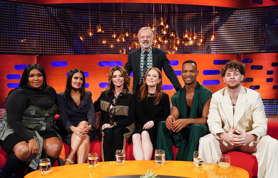 Lizzo, left to right, Salma Hayek Pinault, Shania Twain, Graham Norton, Julianne Moore, Johannes Radebe and Tom Grennan during filming for the Graham Norton Show (Ian West/PA)