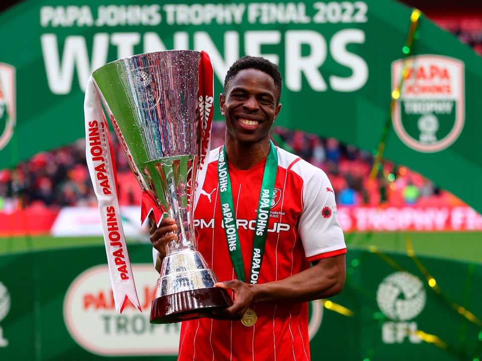 Ireland star Chiedozie Ogbene poses for a photo with the Papa John's Trophy after Rotherham United's victory over Sutton United at at Wembley Stadium