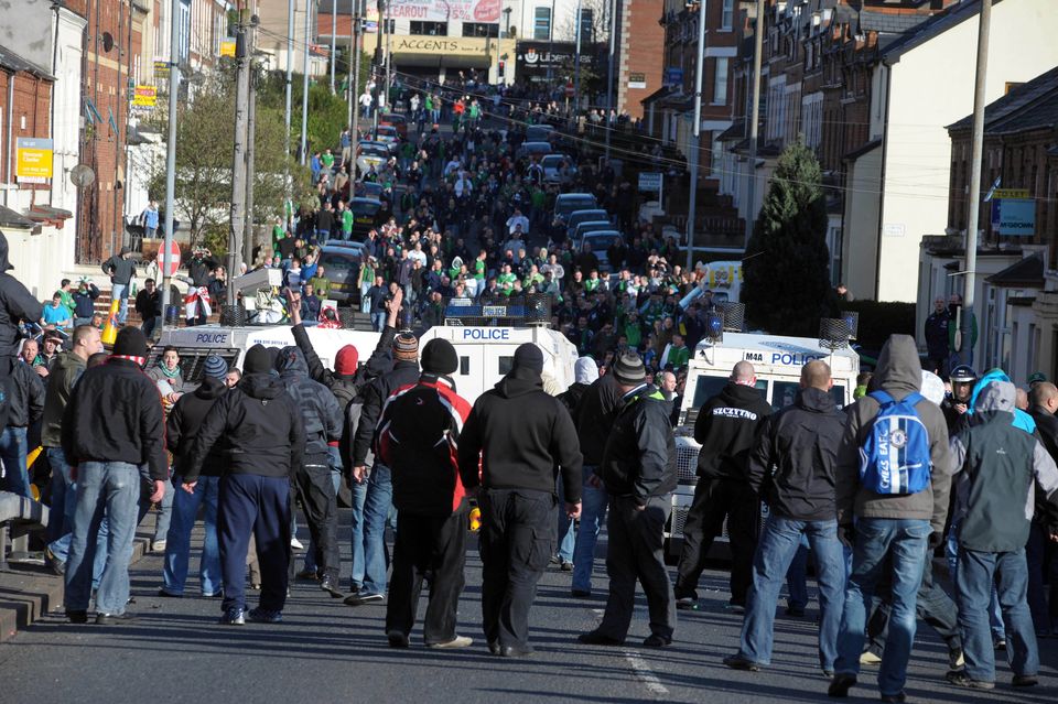 Polish supporters face off against the PSNI at Windsor Park