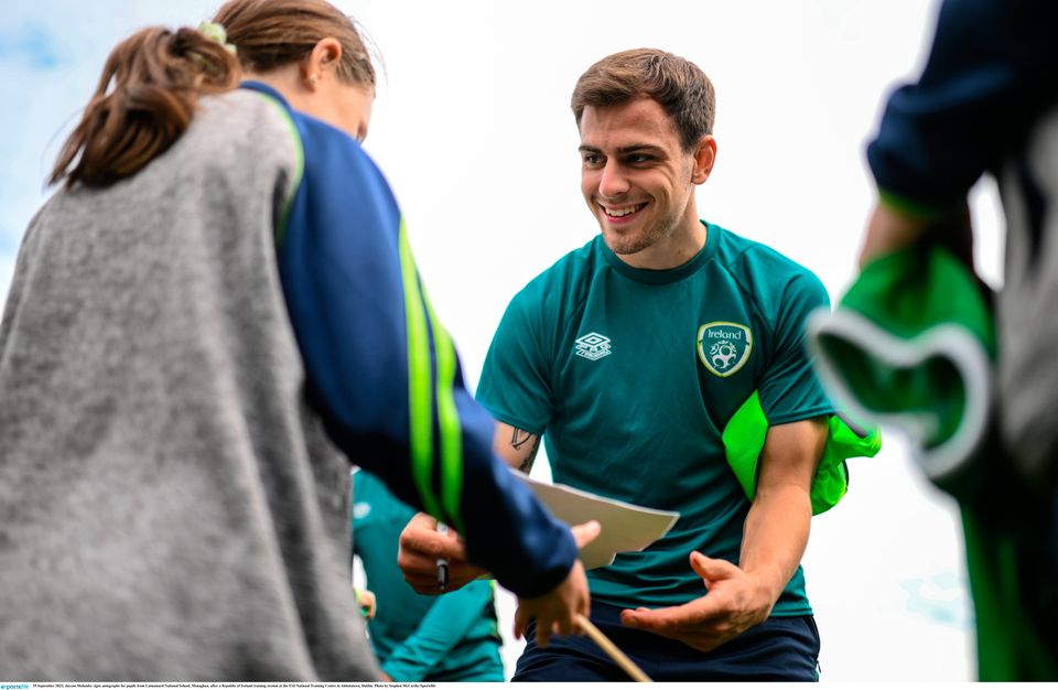 Jayson Molumby signs autographs for pupils from Latnamard National School, Monaghan, after a Republic of Ireland training in Abbotstown. Photo: Stephen McCarthy/Sportsfile