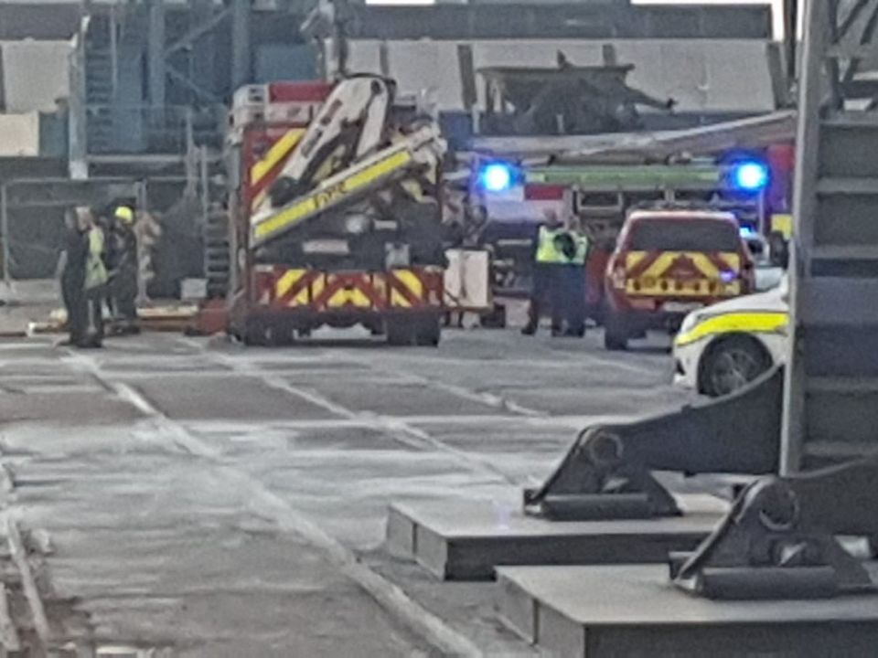 Emergency services at the scene where the car went into the River Lee