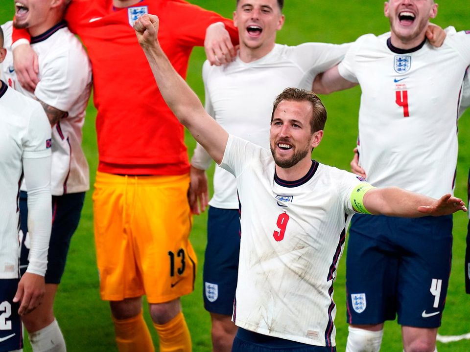 England's Harry Kane and team-mates celebrate winning their semi-final win over Denmark