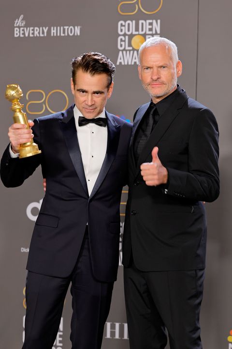 BEVERLY HILLS, CALIFORNIA - JANUARY 10: (L-R) Colin Farrell and Martin McDonagh, winners of Best Picture - Musical/Comedy for "The Banshees of Inisherin", pose in the press room during the 80th Annual Golden Globe Awards at The Beverly Hilton on January 10, 2023 in Beverly Hills, California. (Photo by Amy Sussman/Getty Images)